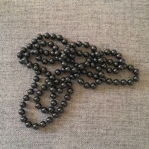 Long black beads